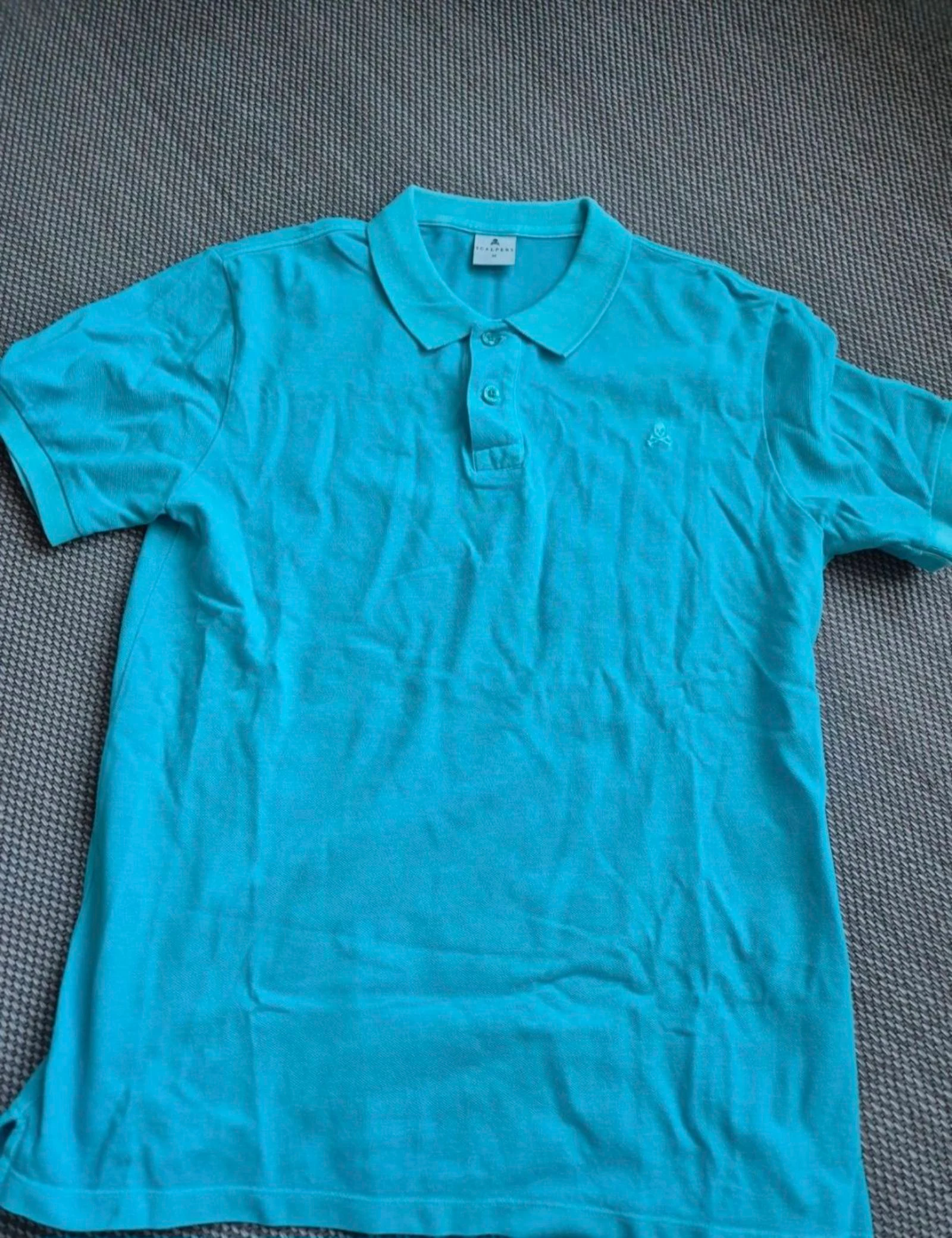Polo azul Scalpers. Talla M
